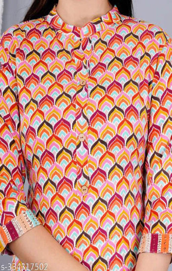 Colorful patterned shirt with geometric design on a plain background